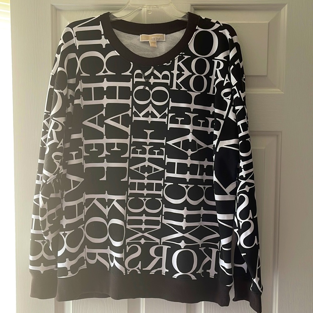 NWOT XL Michael Kors sweat shirt like. 70% cotton 30% polyester.